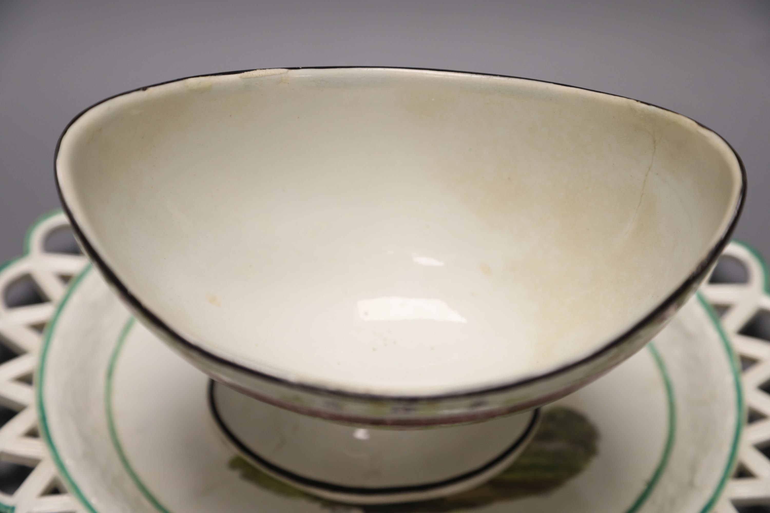 A 19th century creamware sugar bowl and a similar Wilson oval stand, longest 26cm